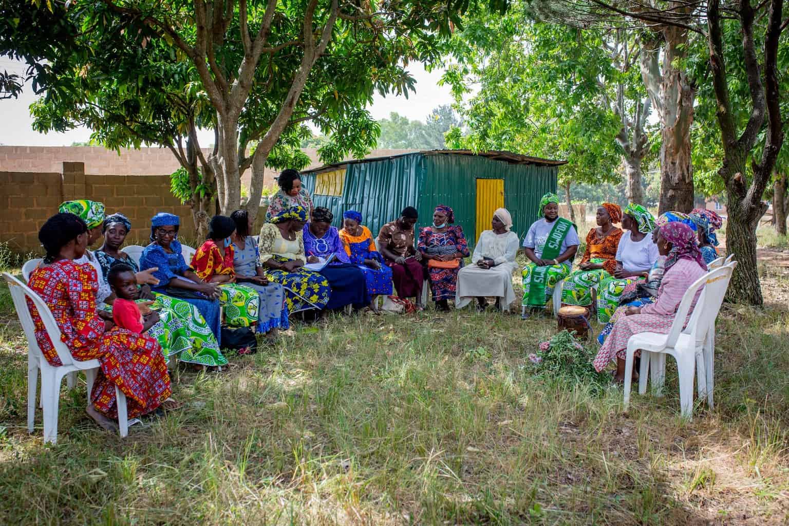 Members of the Small-scale Women Farmers Organization in Nigeria gather for a meeting to receive updates and skills training